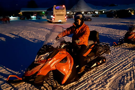 Hotel Manager Jan Novak on snowmobile